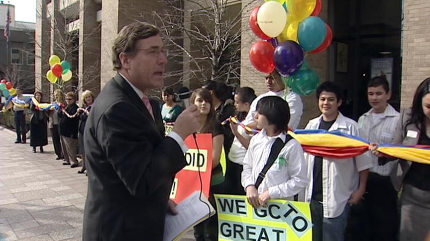 Students wrap building in friendship bracelet