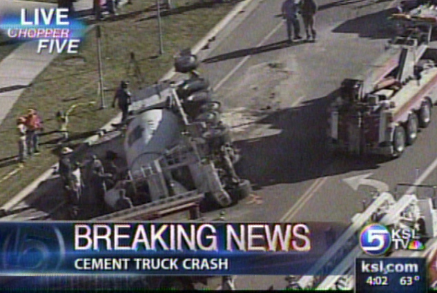 Cement Truck Rolls in Busy Intersection