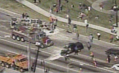 Cement Truck Rolls in Busy Intersection