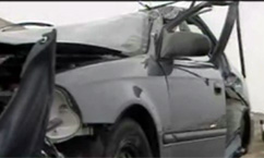 Car Collides With Semi-Trailer