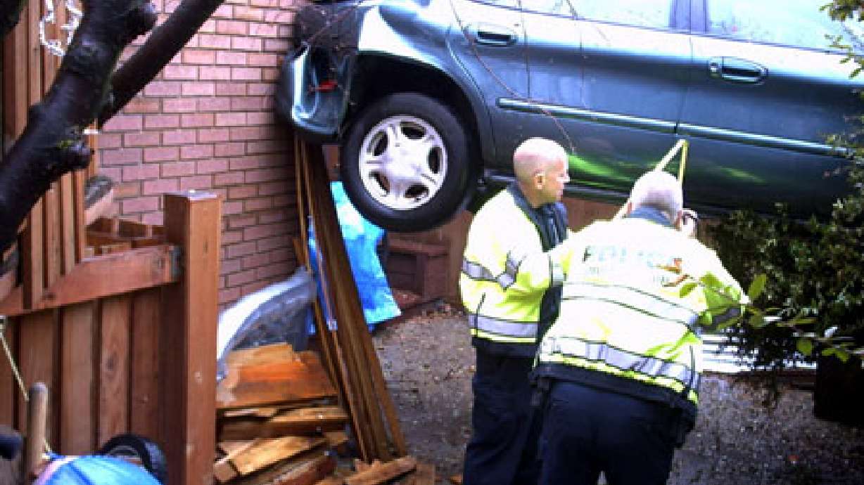 Car crashes into condominium