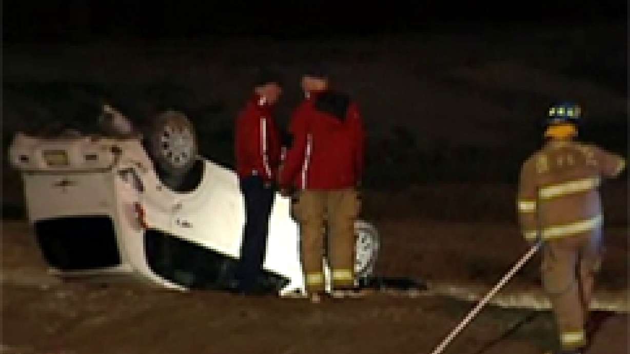 Crews search for woman believed to be in crashed car