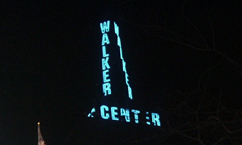 Historic weather tower lights up skyline