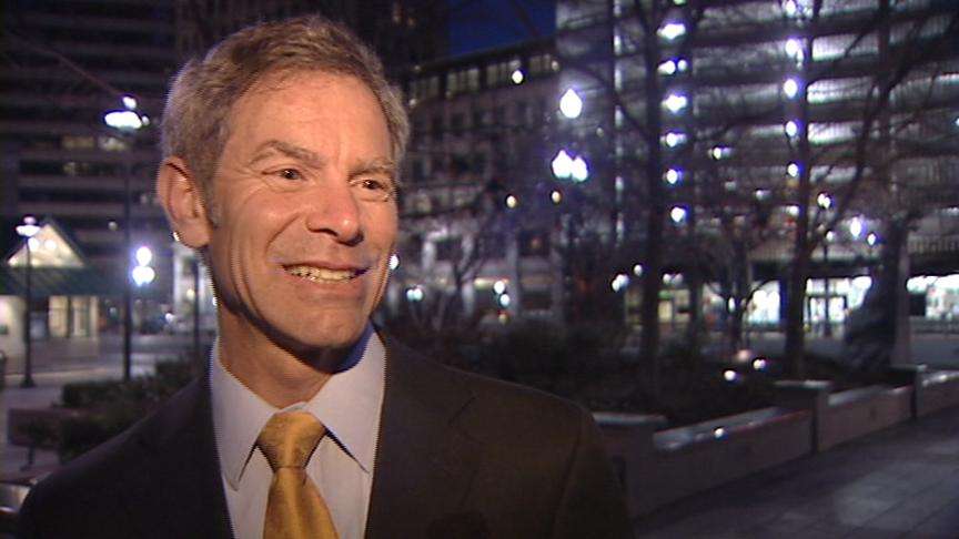 Historic weather tower lights up skyline