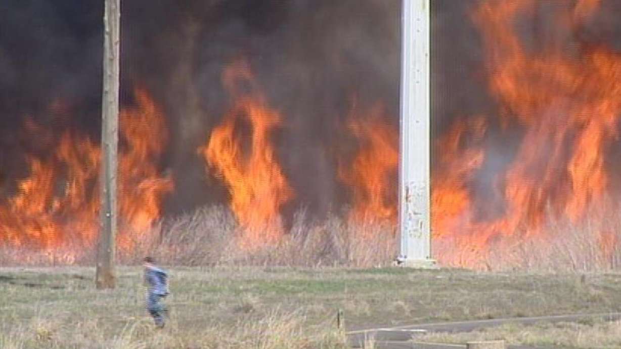 Wildfire burns along Jordan River Parkway