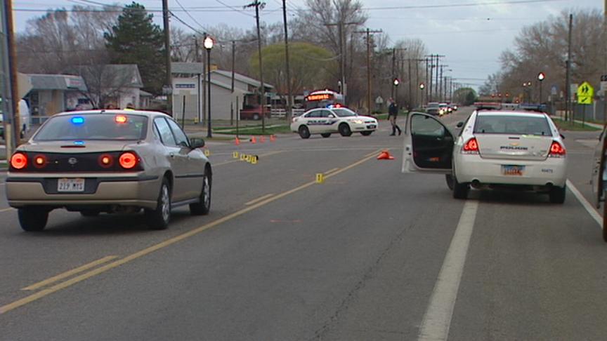 Woman hit and killed while crossing street