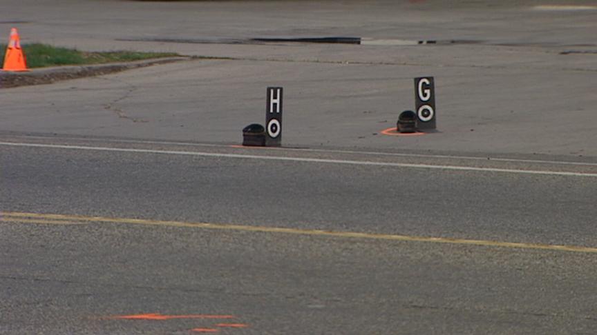 Woman hit and killed while crossing street