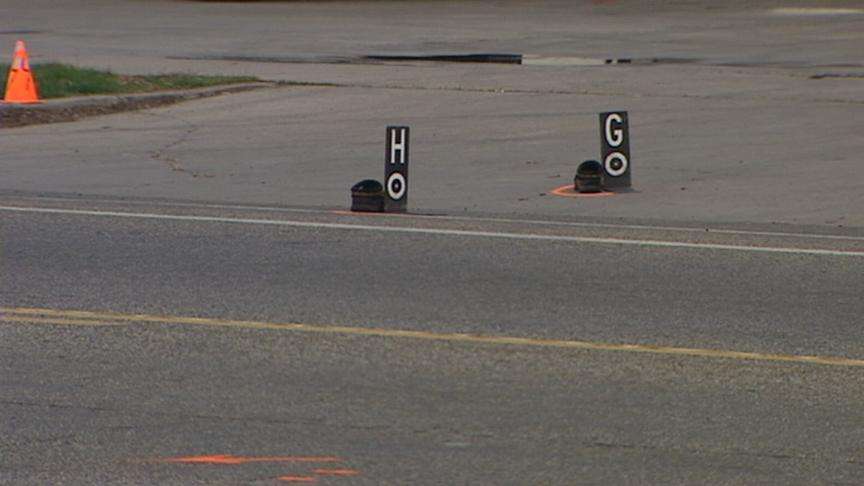 Woman hit and killed while crossing street