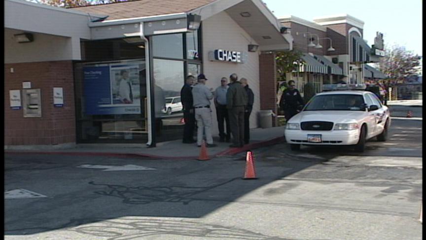 Suspect Opens Fire During Bank Robbery 