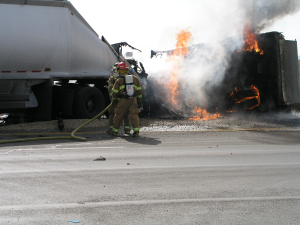 Coal truck driver dies after collision with gravel truck