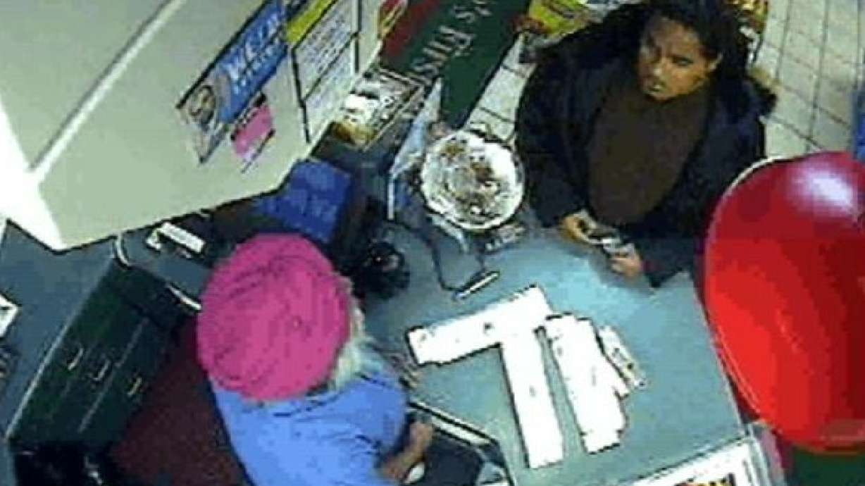 Surveillance Video Shows Four Robbery Suspects