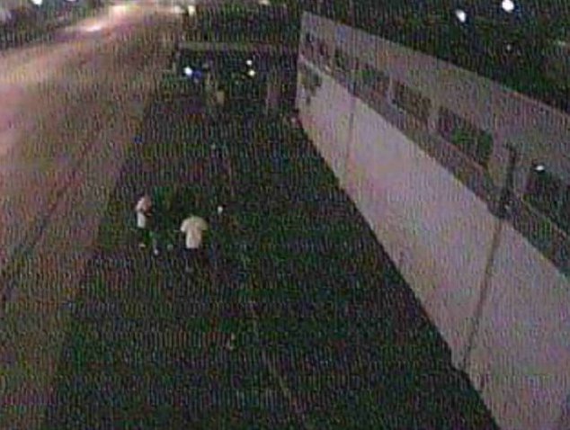 Surveillance Video Shows Four Robbery Suspects