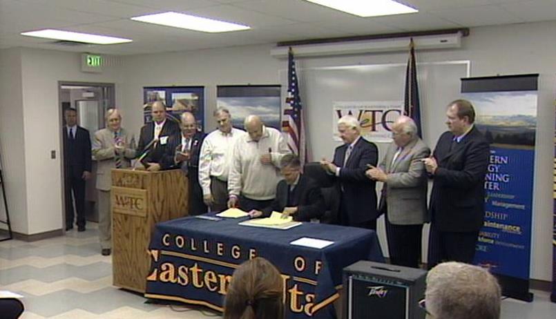 Governor signs mine safety bill on same day families of miners file lawsuit