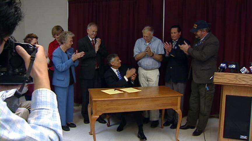 Governor hosts ceremonial signing of animal-cruelty bill