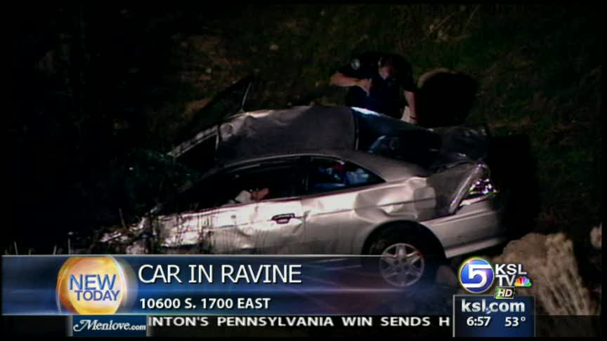 Car slides into ravine