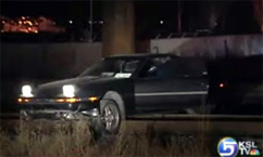 Driver High-Centers Car on Railroad Track