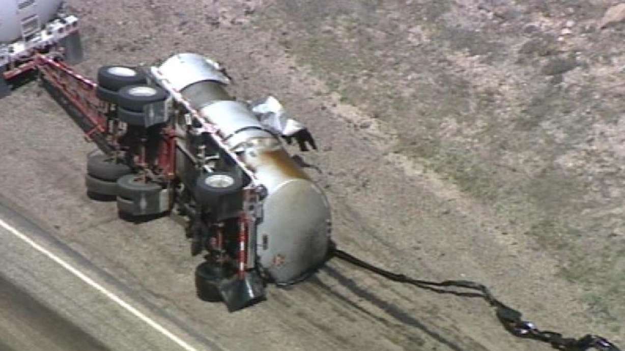Road partially re-opens after tanker spill