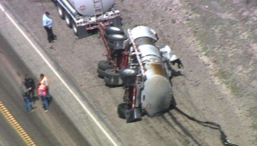 Road partially re-opens after tanker spill