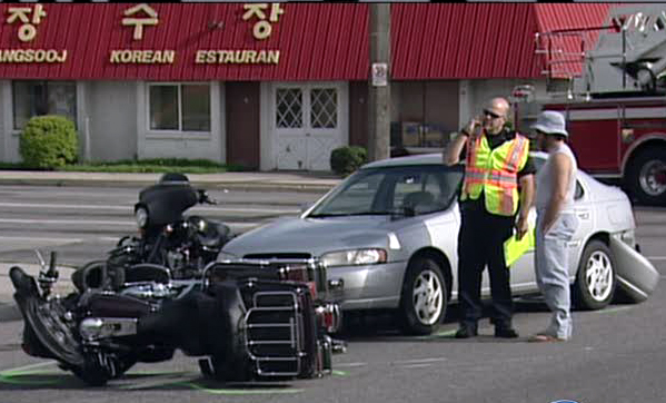 Motorcyclist dies in rush-hour wreck