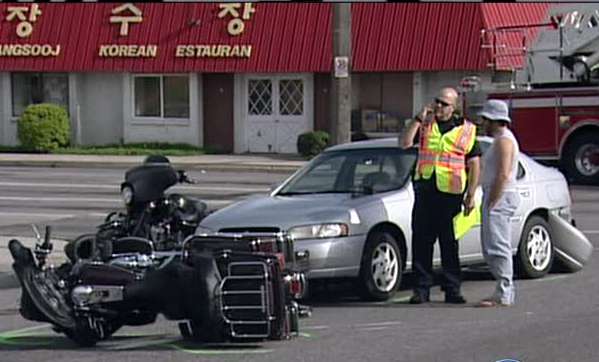 Motorcyclist dies in rush-hour wreck
