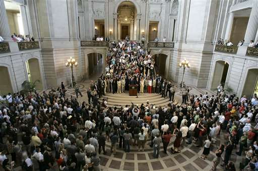 San Francisco mayor Gavin Newsom speaks at a news conference with same sex couples and city officials at City Hall in San Francisco on Thursday, May 15, 2008, after the California Supreme Court overturned a voter-approved ban on gay marriage in a ruling that would allow same-sex couples in the biggest U.S. state to wed. (AP Photo/Tony Avelar)