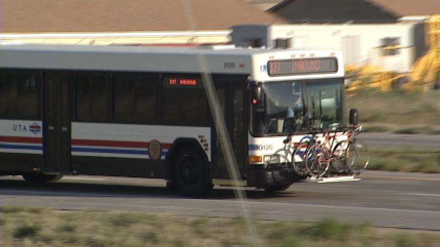 Man Walks Through Traffic, Climbs on Top of Bus
