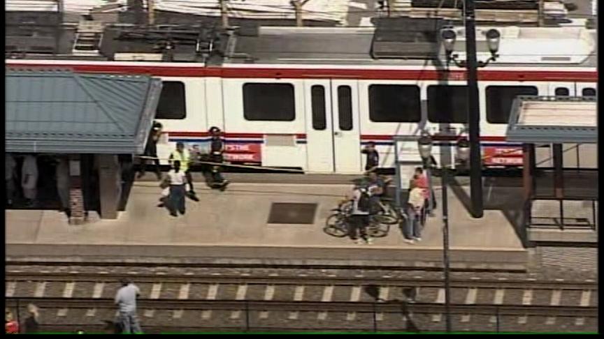 Passenger Falls Under TRAX Train