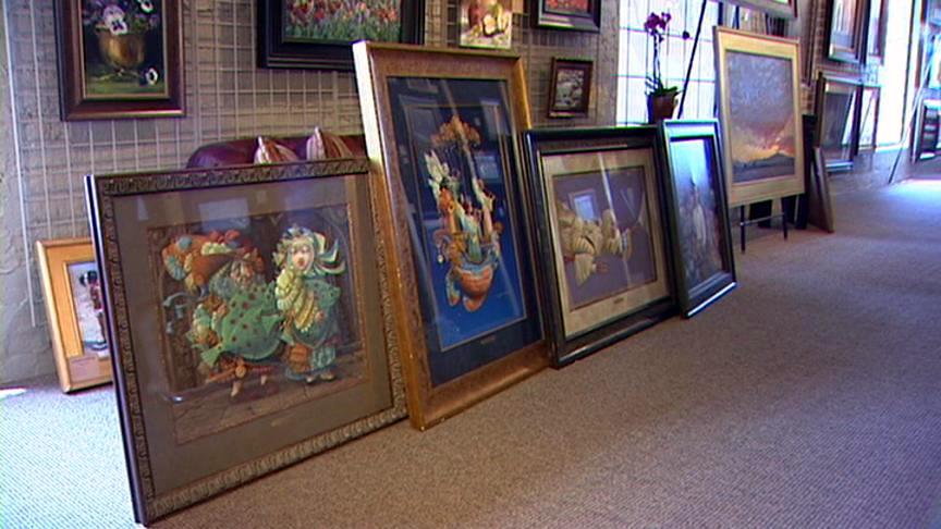 Man arrested as stolen art is recovered