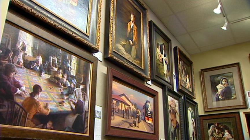 Man arrested as stolen art is recovered