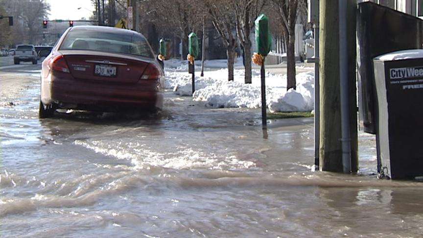Water Main Break Floods Downtown Block