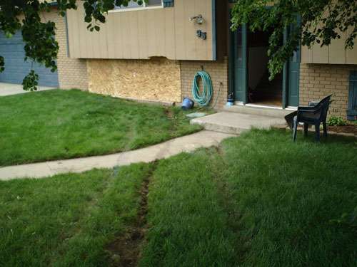 Teenager crashes car into home