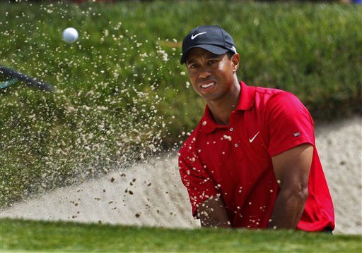 Woods outlasts Mediate for third Open, 14th major