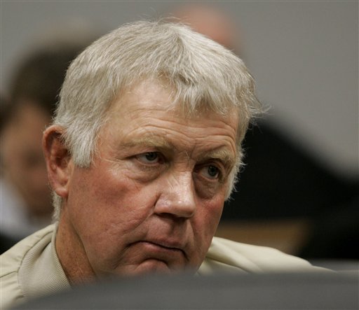 Lemuel Redd listens to his daughter, Julianna Redd Myers, testify against him during a preliminary hearing Wednesday, Dec. 6, 2006, in Provo, Utah. (AP Photo/Douglas C. Pizac, Pool)