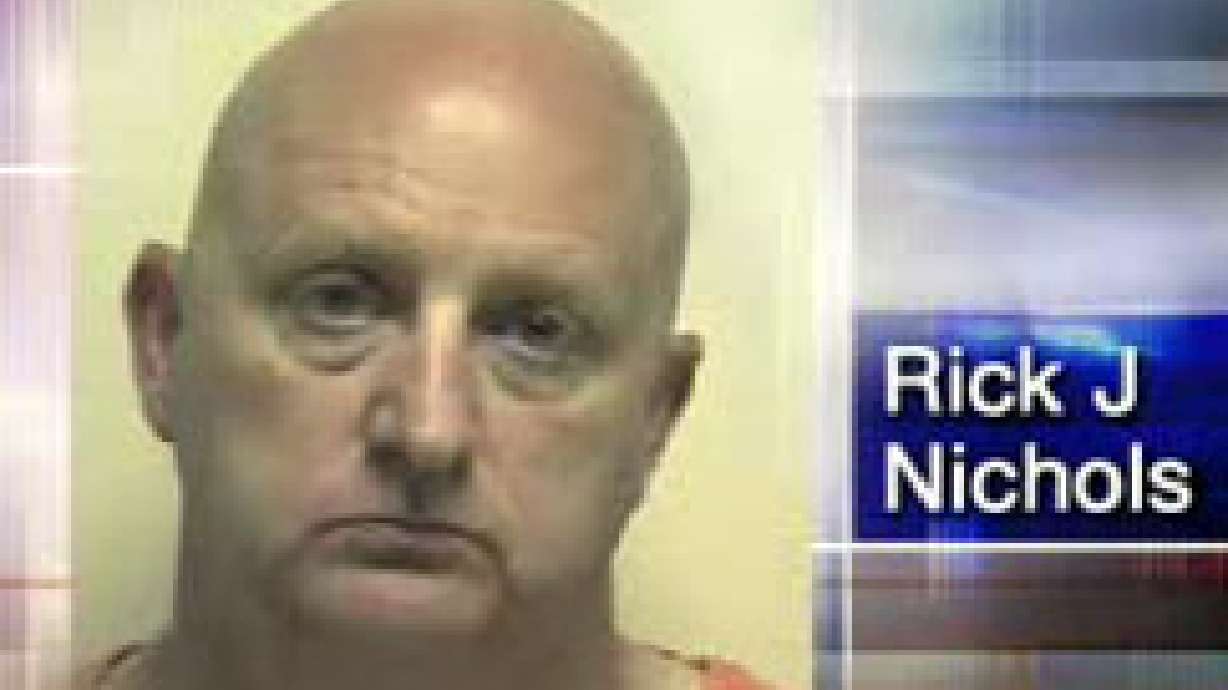 Corrections officer charged in theft