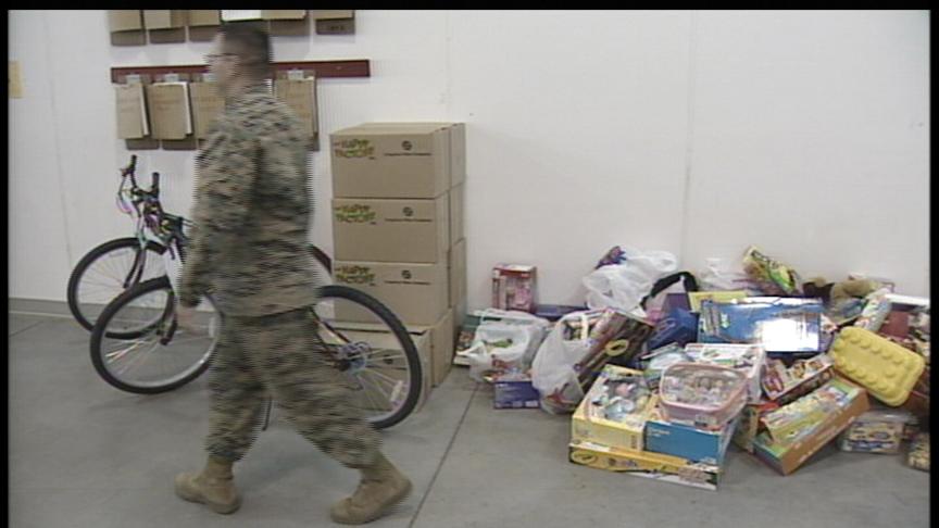 The Happy Factory Delivers Toys for Tots to Camp Williams