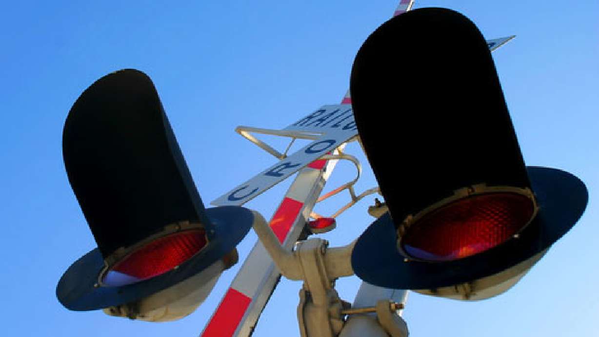 SUV hits train near American Fork; driver killed