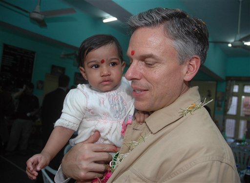 Utah Gov. Jon Huntsman Jr. carries his adopted child Kanak at Matruchhaya Orphanage in Nadiad, 52 kilometers (33 miles) south of Ahmadabad, India, Tuesday, Dec. 19, 2006. The governor renamed Kanak as Asha, which means "hope" in Sanskrit. The governor has five children, one of whom, Gracie Mei,was adopted from China.