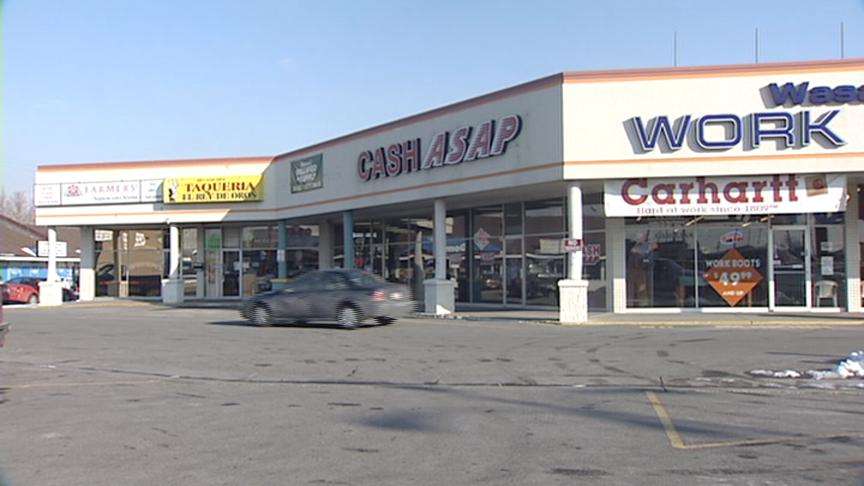 Cash Store Surveillance Tape Shows Robbers' Faces