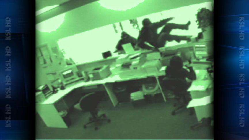 Cash Store Surveillance Tape Shows Robbers' Faces