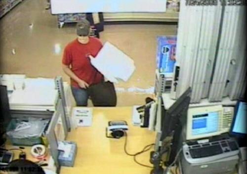 Police searching for woman who held up pharmacy