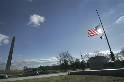 The flags are at half staff at the World War II Memorial and Washington Monument in Washington., Wednesday, Dec. 27, 2006. The funeral procession for former President Gerald Ford is expected to pass by the World War II Memorial and stop for a brief moment.