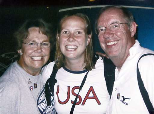 In an undated family photo, Todd Bachman, right, is shown with his wife Barbara, left, and daughter, former Oympian Elisabeth, center. (AP Photo)