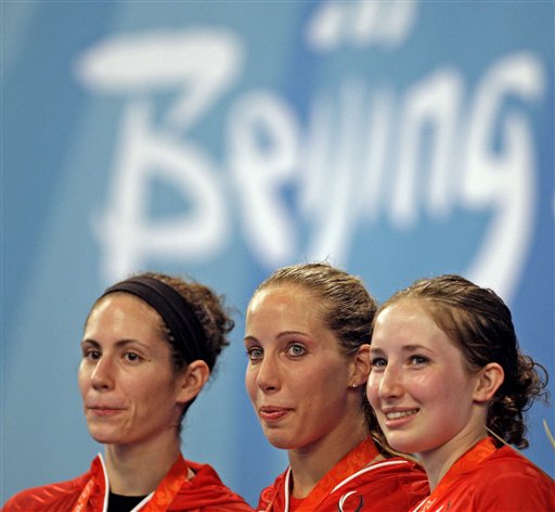 Americans who swept sabre event now face media
