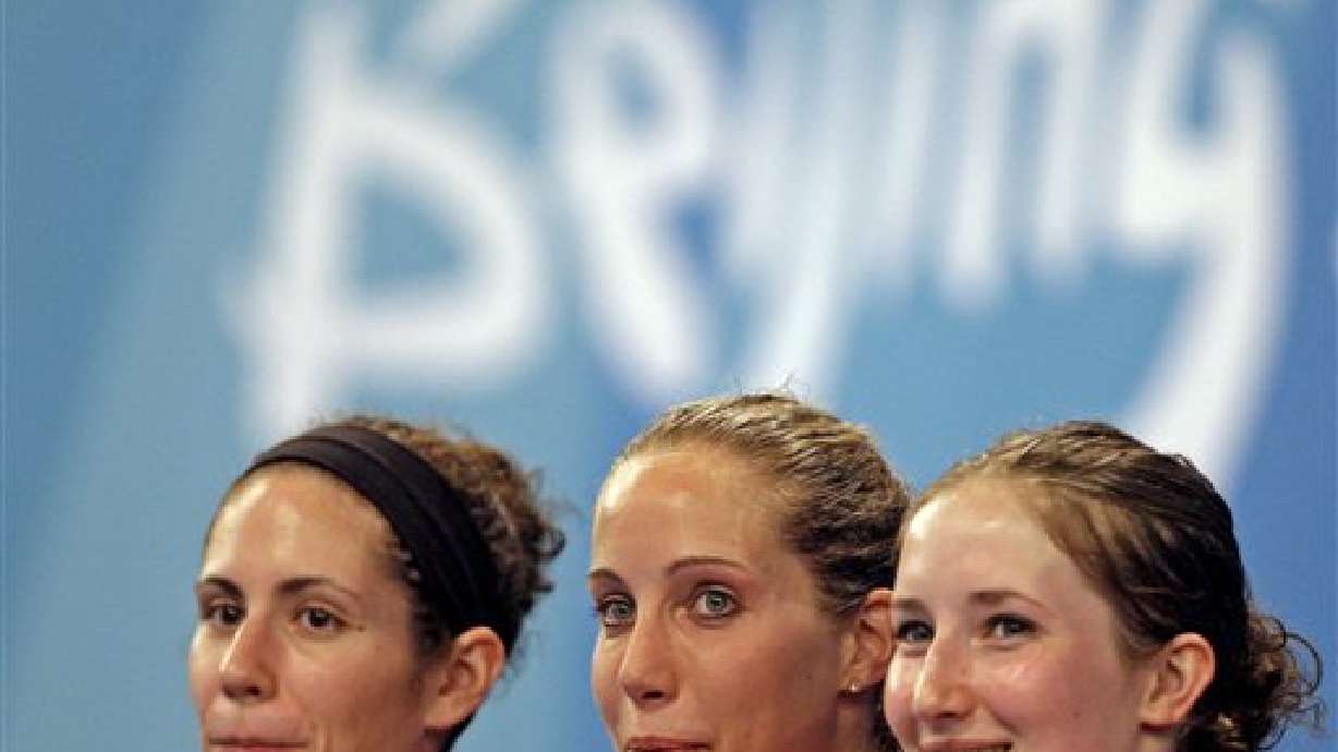 Americans who swept sabre event now face media