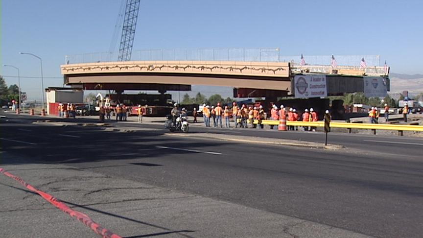 Crews are installing the final freeway bridge of the season