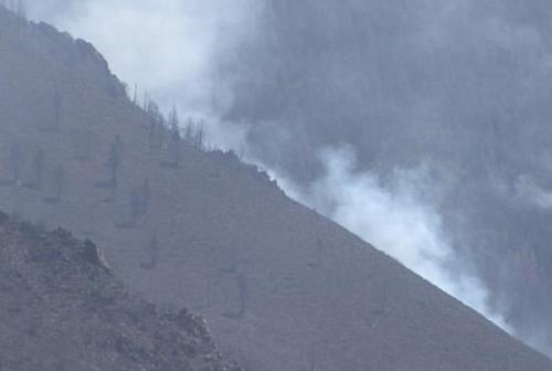 Rain helps crews fighting fire near Moab