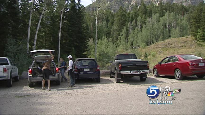 Forest rangers patrol full parking lots in American Fork Canyon
