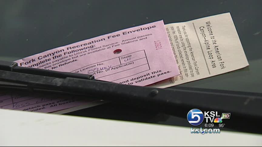 Forest rangers patrol full parking lots in American Fork Canyon