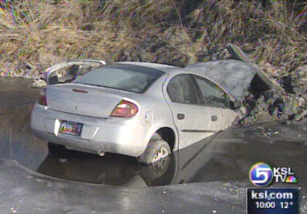 Driver Spends Night in Car in Canal Off Interstate