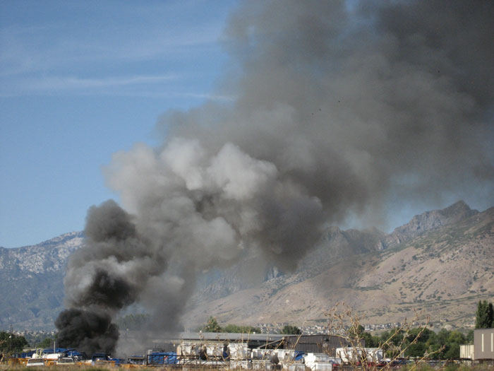 Fire marshal investigating garbage truck fires